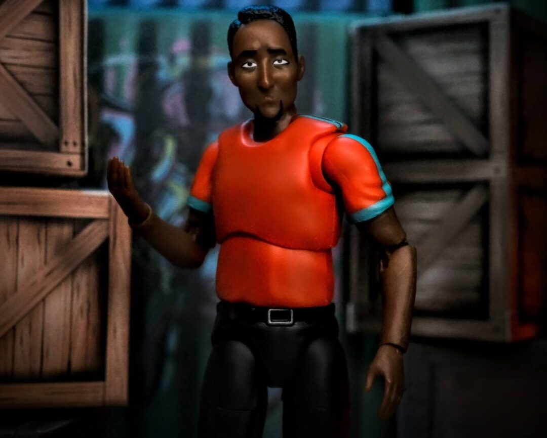 Figures Toy Company Ultimate Wrestling Fan Marvin from Series 5 standing in red shirt and jeans backstage