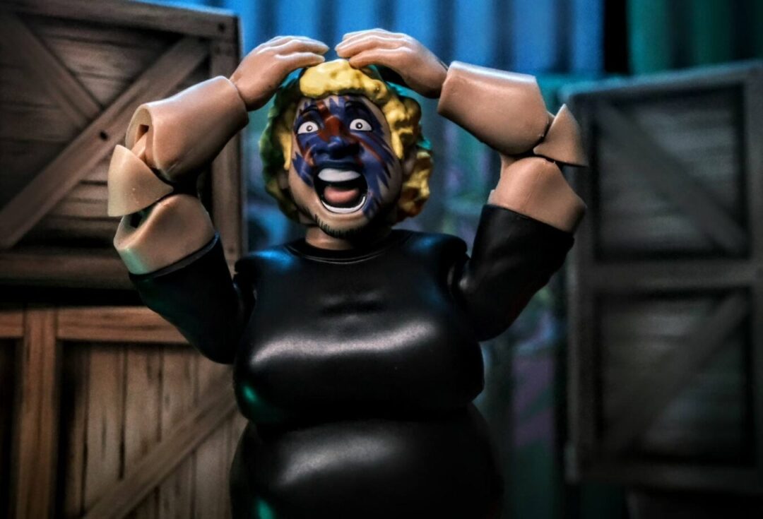 Figures Toy Company Ultimate Wrestling Fan Shawn from Series 5 screaming with hands on head, wearing face paint and black shirt