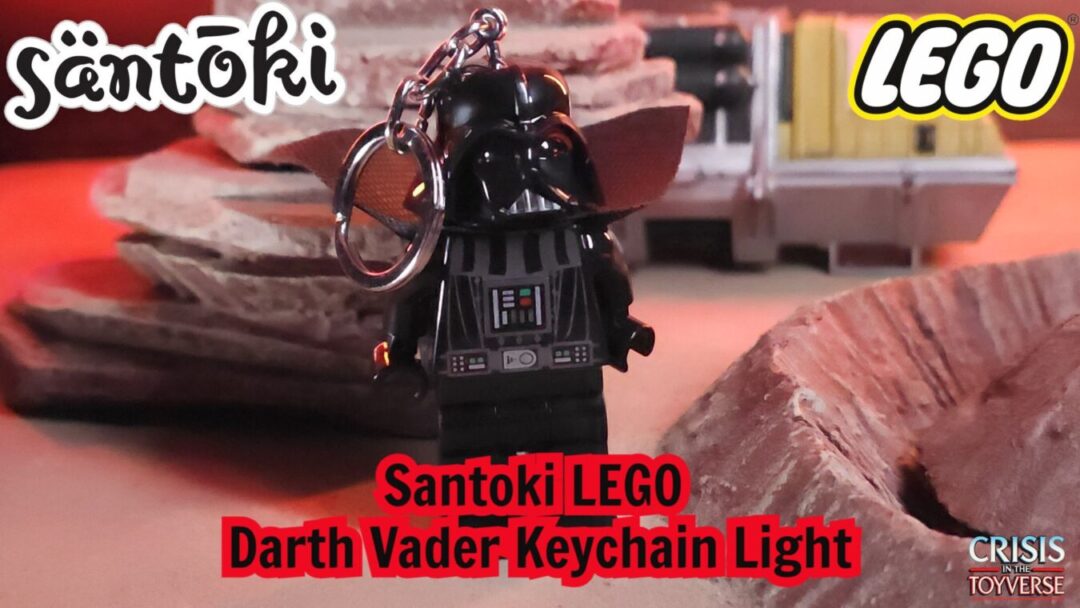 LEGO Darth Vader keychain light from Santoki with red lighting and sci-fi background – Crisis in the Toyverse