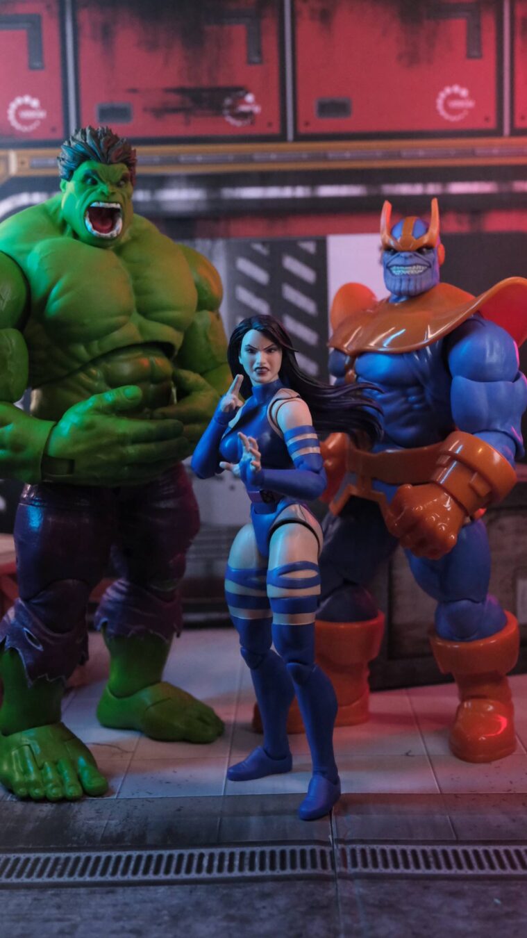 Hulk Psylocke Thanos Marvel Legends Action Figure Diorama Marvel Legends action figures of Hulk, Psylocke, and Thanos posed together in a futuristic diorama scene