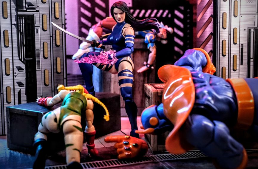 Psylocke Defeats Thanos in Marvel Legends Gamerverse Diorama Setup Psylocke defeats Thanos in an epic Marvel Legends Gamerverse action figure battle, surrounded by fallen characters