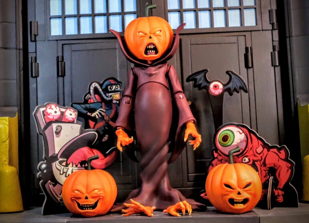 Mondo Toys Real Ghostbusters Samhain accessories and pumpkin heads Mondo Toys Real Ghostbusters Samhain figure with pumpkin heads, cardboard ghost cutouts, and accessories displayed.