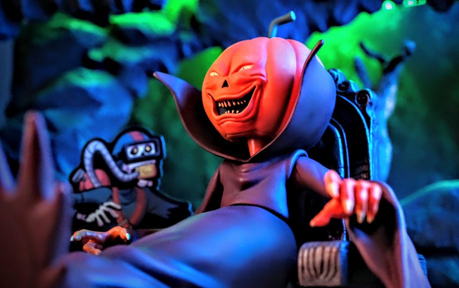 Mondo Toys The Real Ghostbusters Samhain Figure Review Mondo Toys Real Ghostbusters Samhain action figure sitting on throne with eerie lighting.