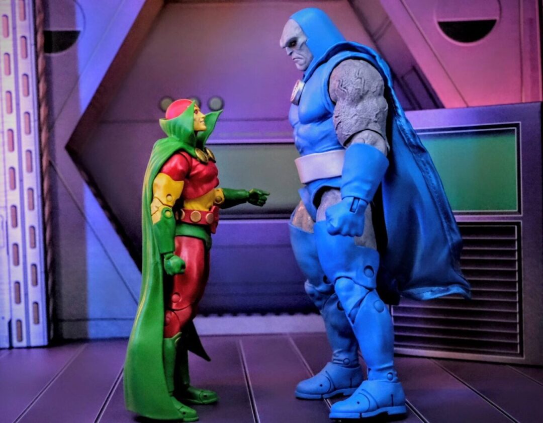 McFarlane Toys Mister Miracle Gold Label with DC Multiverse Megafig Darkseid McFarlane Toys DC Multiverse Mister Miracle Gold Label action figure facing McFarlane Toys DC Multiverse Megafig Darkseid