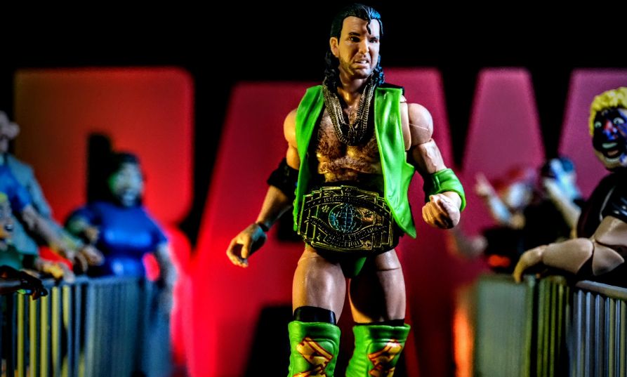 WWE Ultimates Razor Ramon Mattel action figure green attire with Intercontinental Championship entering the ring
