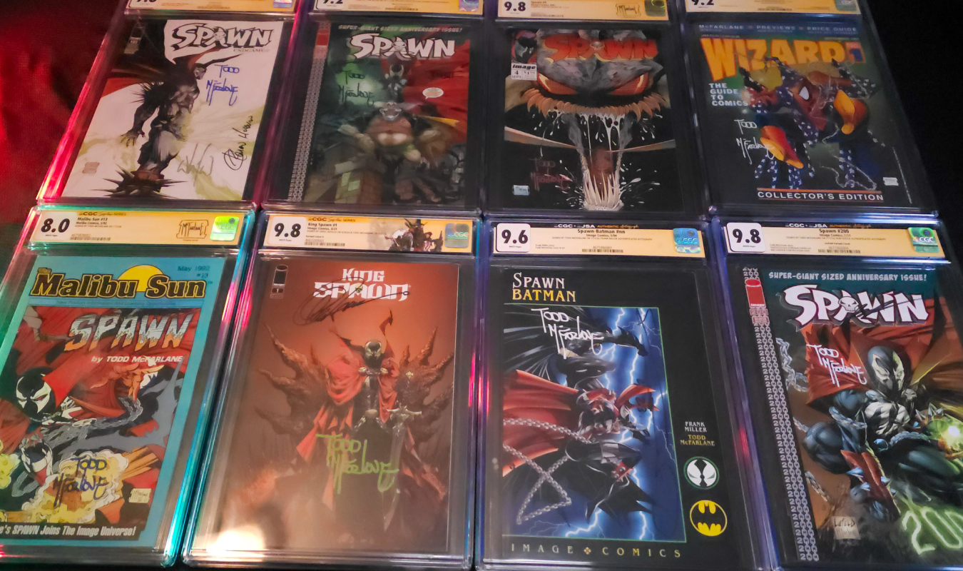 CGC graded Spawn comic collection signed by Todd McFarlane featuring Malibu Sun #13, Spawn #4, Spawn #200 variants, King Spawn #1, and Wizard Magazine #1