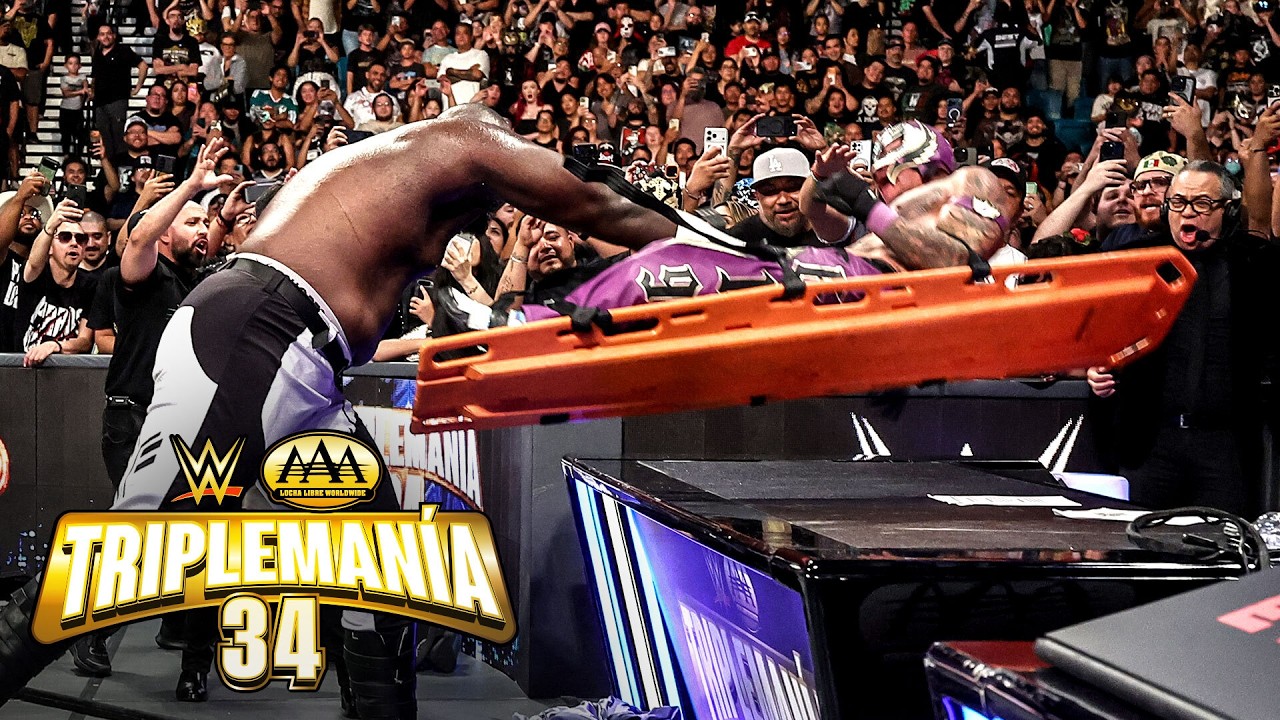 Omos standing over Rey Mysterio after the Triplemania 34 stretcher attack